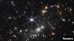 The first full-color image released by NASA from the James Webb Space Telescope shows the galaxy cluster SMACS 0723, in a composite made from images at different wavelengths taken with a Near-Infrared Camera and released July 11, 2022. (NASA)
