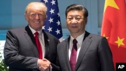 美国总统川普与中国国家主席习近平在德国汉堡握手（2017年7月8日）。