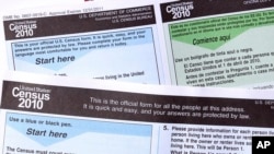 FILE - Copies of the 2010 Census forms are seen during a news conference in Phoenix, Arizona, March 15, 2010.