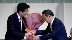 日本首相安倍晉三2020年9月14日向新當選自民黨總裁的菅義偉交棒（路透社）