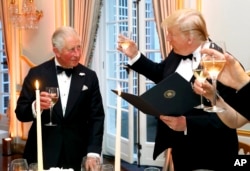 FILE - Presiden Donald Trump dan Pangeran Charles di London, Inggris, 4 Juni 2019.