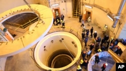 FILE - This photo released by the Atomic Energy Organization of Iran shows the Arak heavy water reactor's secondary circuit, near Arak, Iran, Dec. 23, 2019. The head of the U.N.'s nuclear watchdog agency said efforts to talk to Iran about its atomic program seem to have stalled.