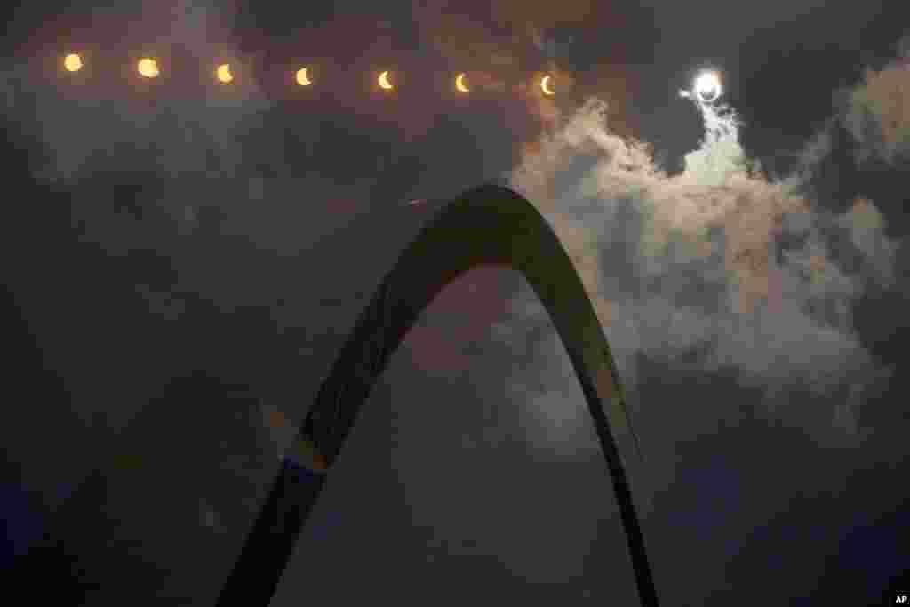 In this multiple exposure photograph, the phases of a partial solar eclipse are seen over the Gateway Arch in St. Louis, Missouri, Aug. 21, 2017. The Gateway Arch was just a few miles outside of the path of totality.