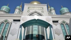 Russian President Vladimir Putin delivers a speech during the opening ceremony of the new Moscow Cathedral Mosque in Moscow, Russia, Sept. 23, 2015.