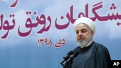 In this photo released by official website of the Office of the Iranian Presidency, President Hassan Rouhani speaks in a meeting in Tehran, Iran, Tuesday, Jan. 14, 2020.
