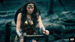 This image released by Warner Bros. Entertainment shows Gal Gadot in a scene from "Wonder Woman." 