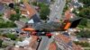 យន្ត​ហោះ​ចម្បាំង OV-10 Bronco លាបពណ៌រំឮក​សង្គ្រាម​លោក​លើកទី១ ហោះ​កាត់​អាកាសយានដ្ឋាន​អន្តរជាតិ​ Flanders មុន​នឹង​ការ​ប្រកួត​ចុះ​ចត​ចម្ងាយ​ជិត​លើ​ដី​ខ្សាច់​ក្នុង​ទីក្រុង​ Wevelgem ប្រទេស​ប៊ែលហ្ស៊ិក។