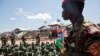 A Sudan People's Liberation Army (SPLA) soldier watches on during a parade celebrating their 29th anniversary in South Sudan's capital Juba, May 16, 2012. 