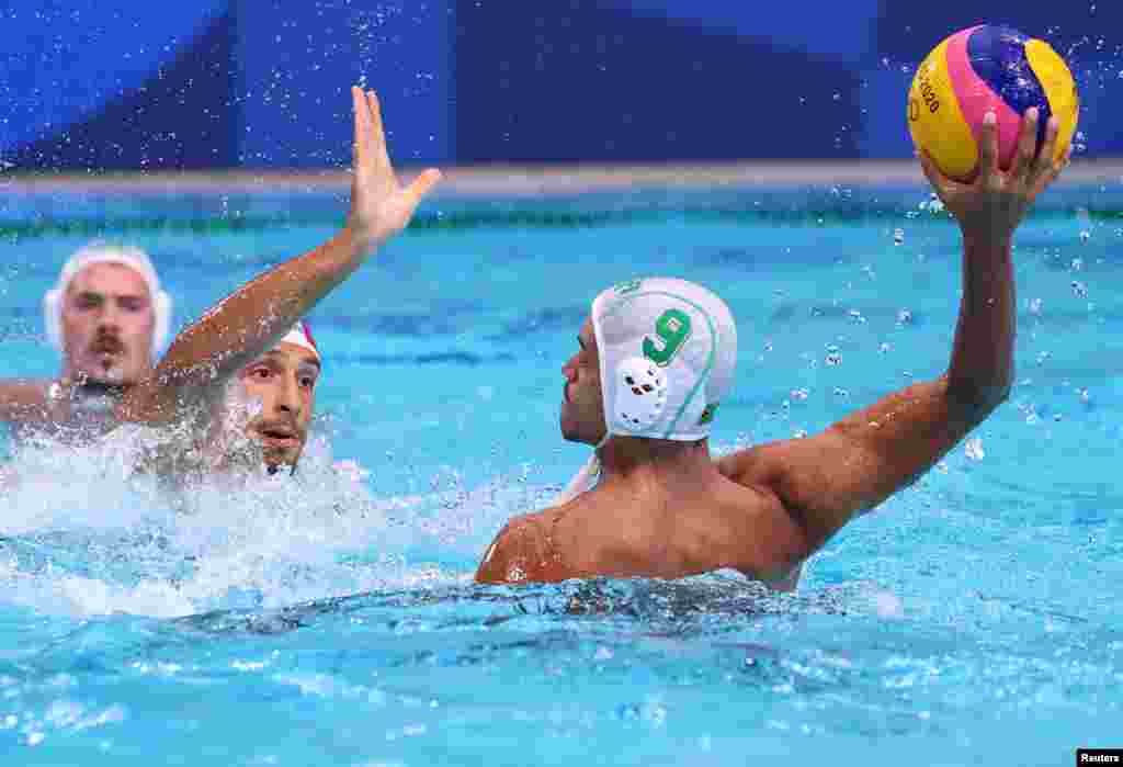  Tatsumi Water Polo Centre, Tokyo, Japan - July 25, 2021. Yaseen Margro of South Africa in action. REUTERS/Kacper Pempel