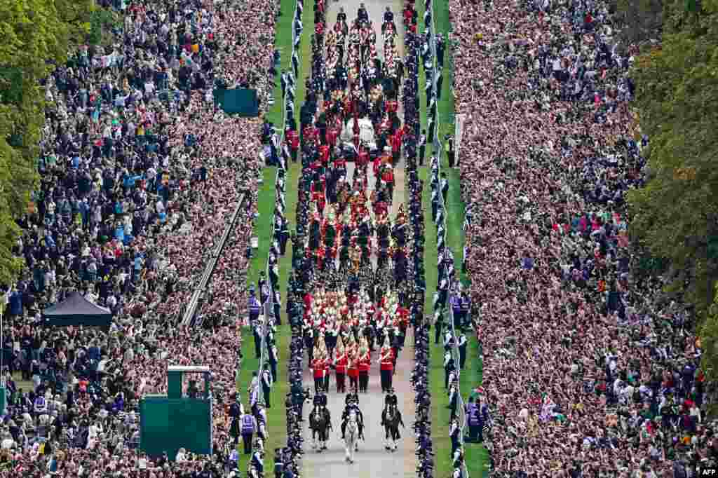 The Ceremonial Procession of the coffin of Queen Elizabeth II travels down the Long Walk as it arrives at Windsor Castle for the Committal Service at St. George's Chapel.