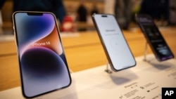 The iPhone 14, iPhone 14 Pro and iPhone 14 Pro Max are displayed at the Apple Fifth Avenue store, Friday, Sept. 16, 2022, in New York. (AP Photo/Yuki Iwamura)