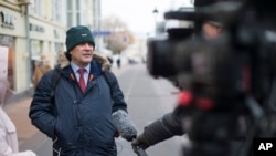 FILE - Sergei Nikitin, the head of Amnesty International in Russia speaks to the media in Moscow, Russia, Nov. 2, 2016.