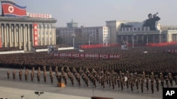 Soldiers and citizens in Pyongyang, North Korea, on Tuesday protested a UN resolution condemning their country's human rights record. (AP Photo/Jon Chol Jin)