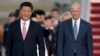 Le président chinois Xi Jinping et le vice-président américain Joe Biden à la base aérienne d'Andrews, au Maryland, le 24 septembre 2015. 