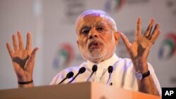 Indian Prime Minister Narendra Modi addresses people during the launch of a "Digital India" project in New Delhi, July 1, 2015.