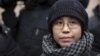 Chinese Dissidents Make Rare Visit to Nobel Laureate's Wife 