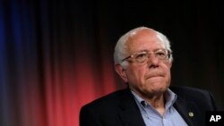 FILE - Democratic presidential candidate Sen. Bernie Sanders, I-Vt., listens to a question during an interview with The Associated Press, May 23, 2016, in Los Angeles.