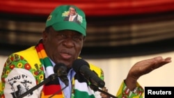 FILE: President Emmerson Mnangagwa addresses an election rally of his ruling ZANU-PF party in Mutare, Zimbabwe, May 19, 2018. 