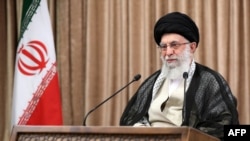 FILE - A handout picture provided by the office of Iran's Supreme Leader Ayatollah Ali Khamenei on May 2, 2021, shows him giving a televised speech in Tehran.