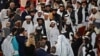 Delegasi Taliban tiba untuk mengikuti penandatanganan perjanjian AS-Taliban di Doha, Ibu Kota Qatar, 29 Februari 2020.