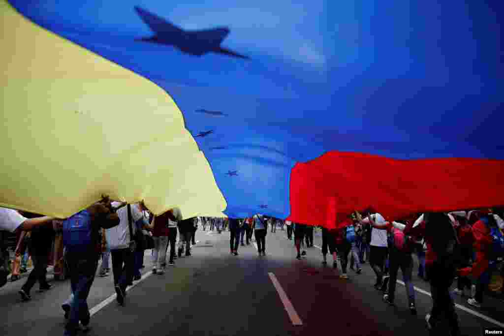 Opposition supporters attend a rally against Venezuelan President Nicolas Maduro's government, in Caracas.