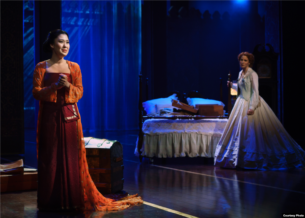 The king’s head wife, Lady Thiang (Ruthie Ann Miles, left), sings about her love for her husband as Anna (Kelli O’Hara) listens. (Paul Kolnik)