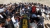 Afghan Taliban Chief Hails Troop Exit as Kabul Bombing Death Toll Soars  