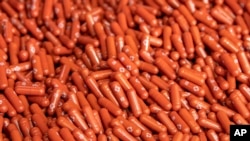 Obat antivirus COVID-19 yang dikeluarkan perusahaan farmasi Merck & Co, Jumat, 1 Oktober 2021. (Foto: AP)