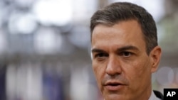 Spain's Prime Minister Pedro Sanchez speaks with the media as he arrives for an EU summit at the European Council building in Brussels, May 24, 2021. 