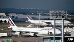 FILE - Orly airport, France, Sept. 18, 2014.