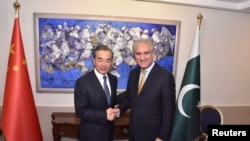 巴基斯坦外长库雷希在伊斯兰堡会晤到访的中国外交部长王毅（2018年9月8号）