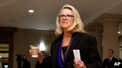 Rep.-elect Carol Miller, R-W.V., arrives for member-elect briefings on Capitol Hill in Washington, Nov. 15, 2018.