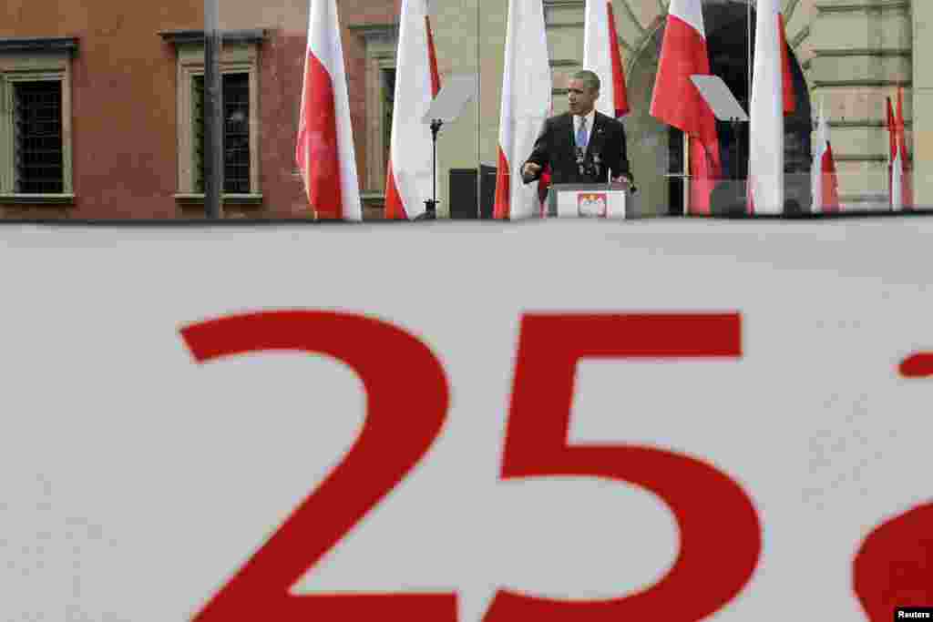 U.S. President Barack Obama speaks during a ceremony marking the "Freedom Day" anniversary in Warsaw's Castle Square, June 4, 2014.