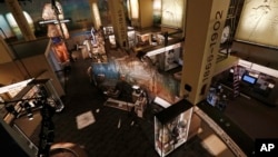 In this Nov. 7, 2017 photograph, media and invited guests were able to get a "sneak peak" into the state's two new history museums, the Museum of Mississippi History, seen, and the Mississippi Civil Rights Museum, in Jackson, Miss.