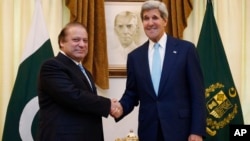 U.S. Secretary of State John Kerry, right, meets with Pakistan's Prime Minister Nawaz Sharif in Islamabad, Pakistan, Aug. 1, 2013. 