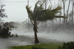 A road is flooded during the passing of Hurricane Dorian in Freeport, Grand Bahama, Bahamas, Sept. 2, 2019.