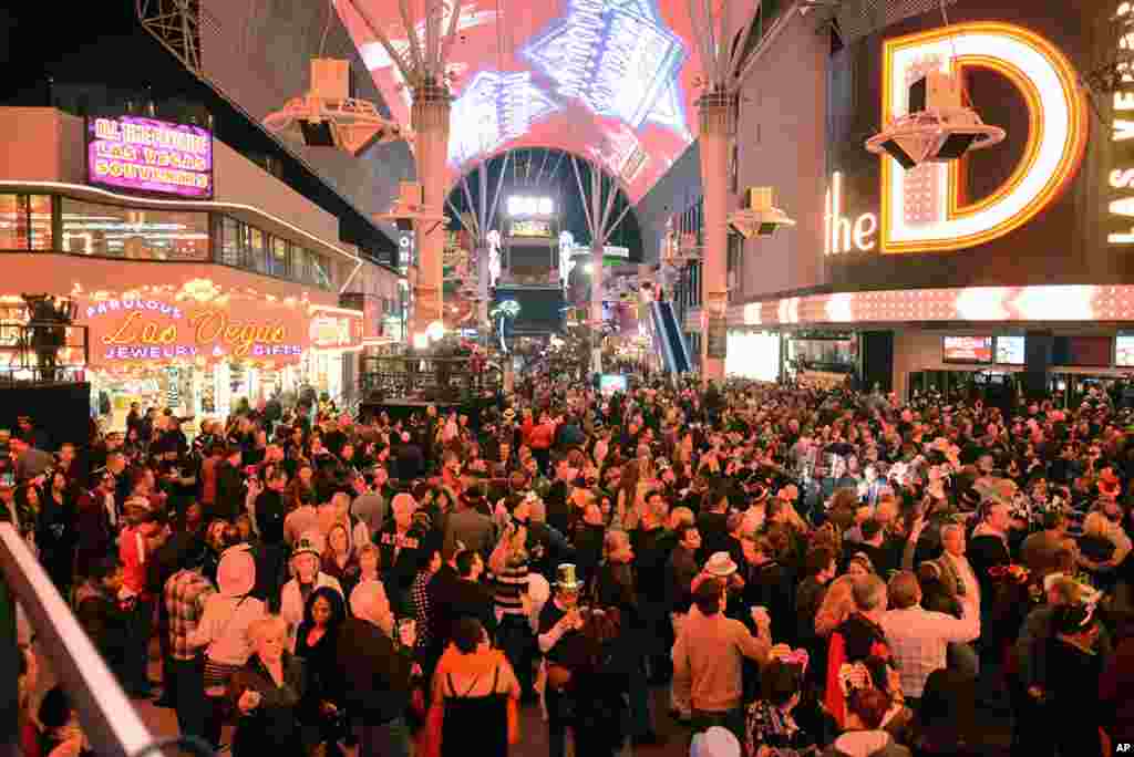 Crowds celebrate at midnight on New Year's 2014 at Fremont Street Experience in downtown Las Vegas, Nevada, Jan. 1, 2014.
