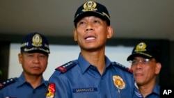 Philippine National Police Director General Ricardo Marquez reads the joint statement of the military and police on the beheading of Canadian hostage John Ridsdel of Calgary, Alberta by Muslim extremist Abu Sayyaf group in southern Philippines on April 26, 2016.