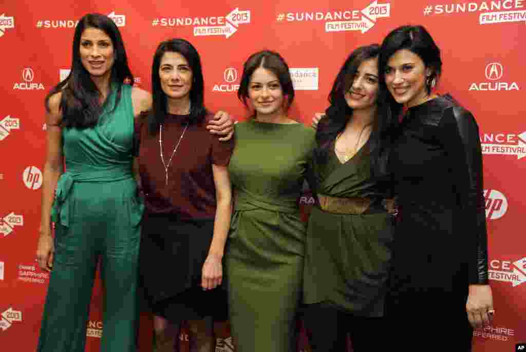 Cherien Dabis, right, writer, director and star of "May in the Summer," poses with cast members at its premiere on the opening night of the 2013 Sundance Film Festival, January 17, 2013.
