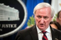Deputy Attorney General Jeffrey Rosen speaks at the Justice Department in Washington, Nov. 5, 2019.