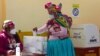 Peruvian Voters Choose Between Two Polarizing Populists