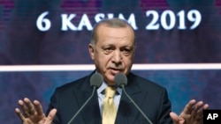 Turkish President Recep Tayyip Erdogan speaks during a meeting in Ankara, Turkey, Nov. 6, 2019. 