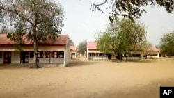 This image taken from video shows the exterior of Government Girls Science and Tech College in Dapchi, Yobe State, Nigeria, Feb. 22, 2018.