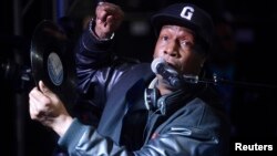 FILE - Hip-hop DJ Grandmaster Flash speaks at a ceremony where he is inducted into Guitar Center's RockWalk in Los Angeles, March 6, 2014.