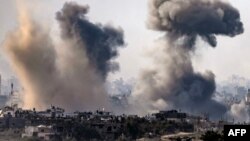 A picture taken from Israel's southern city of Sderot shows smoke rising during Israeli bombardment of the Gaza Strip on October 31, 2023, amid ongoing battles between Israel and the Palestinian Hamas movement. (Photo by FADEL SENNA / AFP)