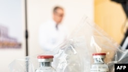 FILE - Vials of the drug remdesivir are seen at a hospital in Germany, April 8, 2020.