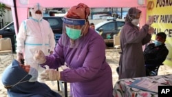 Virus Outbreak Indonesia