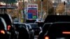 The price of gas is seen as traffic moves through Annapolis, MD, on November 23, 2021. - With inflation surging ahead of the Thanksgiving holiday, US President Joe Biden has drawn on the seldom-used Strategic Petroleum Reserve to combat rising oil prices 