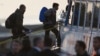 Greece Begins Controversial Deportations