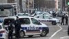French police forces block a street during an operation in the Neudorf district of Strasbourg, eastern France, Thursday, Dec. 13, 2018.